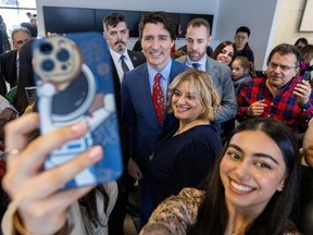 Prime Minister Justin Trudeau poses for photos at the Persian community's Nowruz New Year event in Aurora, Ont., on March 18.