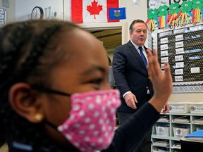 Alberta Premier Jason Kenney visited a classroom at Aurora Academic Charter School in Edmonton on Tuesday March 15, 2022, where Kenney and Alberta Education Minister Adriana LaGrange announced that the Alberta government is investing $25 million in operating funding and $47 million in capital investment over the next three years to support public charter school expansions and collegiate programs in the education system, as part of Budget 2022.