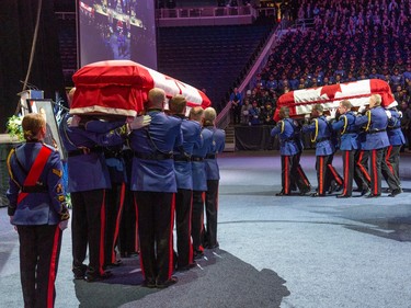 Officers and loved ones take part Monday, March 27, in the regimental funeral for constables Travis Jordan and Brett Ryan, who were fatally shot while responding to a call on March 16, 2023.