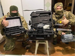 Soldiers in Ukraine with one of the much-needed drones donated in Alberta and ferried to the wartorn country by Edmonton community standards officer Daniel Laskavenko, Shannon Boddez, a nurse at Royal Alexandra Hospital, and business owner Dave Bryenton in December 2022.
