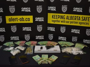 The Alberta Law Enforcement Response Team seized a prohibited 22-calibre handgun with a defaced serial number, 244 grams of cocaine, ammunition, and $9,000 in cash after a year-long drug trafficking investigation in Grande Prairie.
