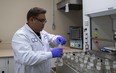 Epcor lab technician Keio Espiritu smells water in the utility company’s process control lab to test for water quality on March 23, 2023. The onset of milder temperatures means Epcor is starting spring runoff preparations to ensure safe and clean drinking water.