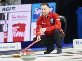 Team Canada skip Brad Gushue delivers a shot during Canada's match against P.E.I. the 2023 Tim Hortons Brier at Budweiser Gardens in London, Ont. on Monday, March 6, 2023. Gushue has been dealing with some lower-body discomfort over his first few days at the Tim Hortons Brier.