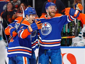 The Edmonton Oilers celebrate a goal scored by defencemen Mattias Ekholm (14) during the third period against the San Jose Sharks at Rogers Place on Monday, March 20, 2023.