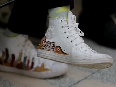 Edmonton Mayor Amarjeet Sohi wears custom painted YEG/Treaty 6 shoes during a 2023 Junos kickoff celebration at Edmonton City Hall, Thursday March 9, 2023. The shoes were created by local artist Macha Abdallah.