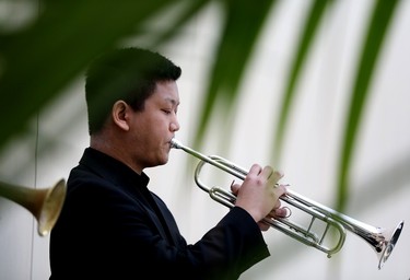 Kevin Yue performs Allan Gilliland's Juneau, A fanfare to celebrate the 2023 Junos, during a 2023 Junos kickoff celebration at Edmonton City Hall, Thursday March 9, 2023.