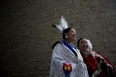 (left to right) Fancy Shawl Dancer Christie Nepoose and Traditional Dancer Eartha Goodstriker wait to perform during a 2023 Junos kickoff celebration at Edmonton City Hall, Thursday March 9, 2023.