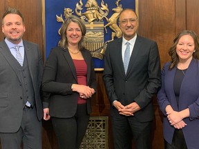 Mental Health and Addiction Minister Nicholas Milliken, left, Premier Danielle Smith, Edmonton Mayor Amarjeet Sohi and Municipal Affairs Minister Rebecca Schulz met at the legislature on Tuesday, March 7, 2023.