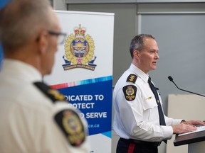 Edmonton Police Deputy Chief Devin Laforce, right, and Supt. Shane Perka of the EPS Criminal Investigations Division provide an update on the investigation on March 23, 2023 into the deaths of two officer in Edmonton a week prior.
