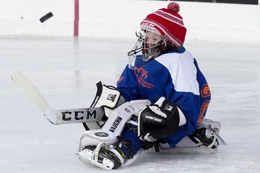 Jesse Saik, 11, makes a save as he takes part in the Kids World's Longest Hockey Game in support of the Ben Stelter Fund and the Stollery Children's Hospital, at Saiker's Acres, 52269 Range Rd 220, east of Edmonton Saturday March 4, 2023.