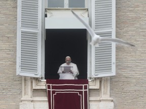 Pope Francis delivers the Angelus noon prayer in St. Peter's Square, at the Vatican, Sunday, Jan. 8, 2023.
