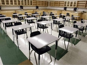 Desks at Monsignor Fee Otterson located at 1834 Rutherford Road SW. File photo.