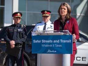 Premier Danielle Smith speaks during a press conference announcing measures to tackle the rising violent crimes in Calgary and Edmonton outside the Sunalta CTrain station in Calgary on Tuesday, April 4, 2023.