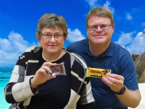 Crystal Regehr-Westergard and husband Bert with two of their recreated chocolate bars.