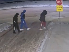Edmonton police are linking the death of a 20-year-old man to the homicides of a pair found injured in a vehicle about a week earlier. Video surveillance shows the suspect shooter wearing a unique black Hugo brand sweatsuit and black Yeezy brand shoes.