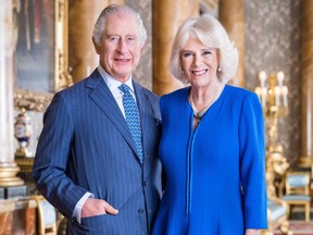 An official photo taken on March 2023 and issued by Buckingham Palace on April 4, 2023 shows King Charles III and Queen Camilla, at Buckingham Palace, in London.