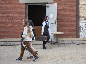 Students taking part in the The Edmonton Cantando Festival making their way into the gym at the Knox Evangelical Church in Old Strathcona on April 17, 2023. About 3000 students from across the prairies are taking part in the five day festival.
