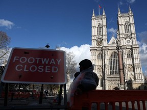Barriers outside Westminster Abbey in central London as preparations get underway ahead of the coronation of King Charles III.