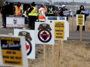 Teamsters Local Union 362 holds a union organizing campaign outside the Amazon facility, 1440 39 Ave., in Nisku on Wednesday, April 26, 2023. David Bloom/Postmedia