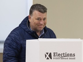 Dennis King, leader of the Progressive Conservative Party of P.E.I., prepares to cast his vote in the provincial election in Hunter River, P.E.I on Monday, April 3, 2023.