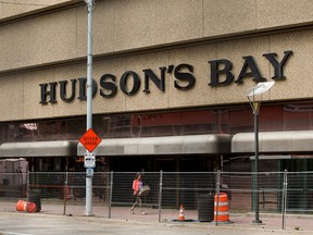 A pedestrian makes their way past the closed Hudson's Bay store in Edmonton's City Centre Mall, Friday June 11, 2021. Photo by David Bloom