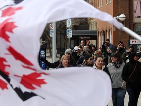 Federal employees walk a picket line around Canada Place in Edmonton on Wednesday, April 19, 2023.
