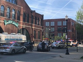 Louisville Metro Police deploy for an 'active police situation' that includes mass casualties near Slugger Field in Louisville, Kentucky, U.S. April 10, 2023.