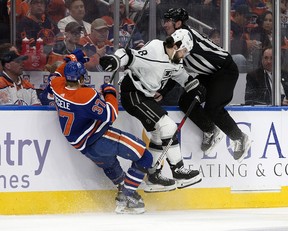 The Edmonton Oilers' Warren Foegele (37) battles the Los Angeles Kings' Drew Doughty (8) during second period NHL playoff action at Rogers Place in Edmonton, Tuesday April 25, 2023.
