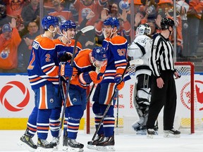 The Edmonton Oilers celebrate a goal by an injured Zach Hyman (18) during second period NHL playoff action against the Los Angeles Kings at Rogers Place in Edmonton, Tuesday April 25, 2023.