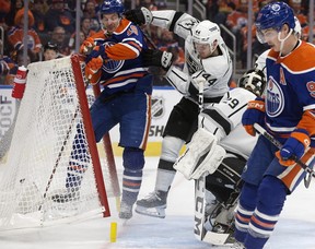 The Edmonton Oilers' Zach Hyman (18) scores his second goal of the game while being checked by the Los Angeles Kings' Mikey Anderson (44) during third period NHL playoff action at Rogers Place in Edmonton, Tuesday April 25, 2023. The Oilers won 6-3.