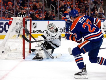 The Edmonton Oilers' Brett Kulak (27) scores on Los Angeles Kings' goalie Joonas Korpisalo (70) during first period NHL playoff action at Rogers Place in Edmonton, Tuesday April 25, 2023.