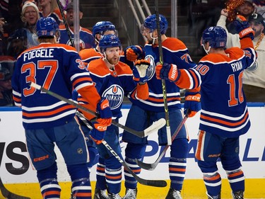 The Edmonton Oilers celebrate Brett Kulak's (27) goal against the Los Angeles Kings during first period NHL playoff action at Rogers Place in Edmonton, Tuesday April 25, 2023.