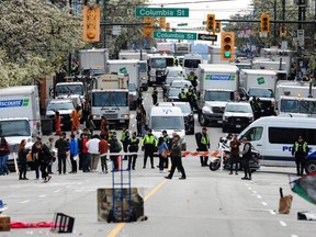 Scenes from E. Hastings St as the City of Vancouver remove tents with the Vancouver Police Department standing by in Vancouver, BC., April 5, 2023.