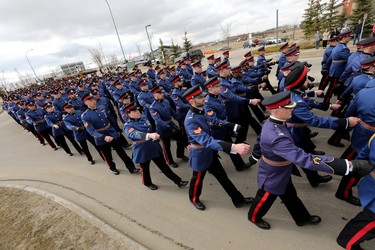 Police officers members march in a regimental funeral procession for Const. Harvinder Singh Dhami in Sherwood Park, Alta., Thursday April 20, 2023. Photo by David Bloom