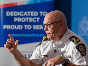 Police Chief Dale McFee talks to reporters on Friday, April 28, 2023 in Edmonton.