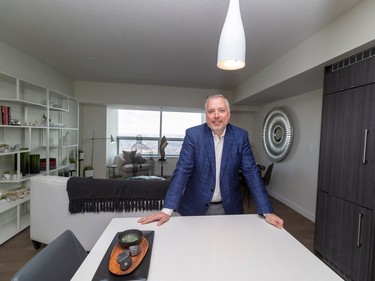 Robert McLeod President & Broker of McLeod Realty & Management Ltd stands in the penthouse condo in the Sky Residences at Ice District 66 storeys up as Full House Lottery unveils its Early Bird prize in support of the Royal Alex and University of Alberta Hospitals. Taken on Wednesday, April 5, 2023 .   Greg Southam-Postmedia