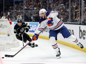 Vincent Desharnais #73 of the Edmonton Oilers makes a break out pass in front of Carl Grundstrom #91 of the Los Angeles Kings during the second period in Game 3 of the first round of the 2023 Stanley Cup Playoffs at Crypto.com Arena on April 21, 2023, in Los Angeles, Calif.