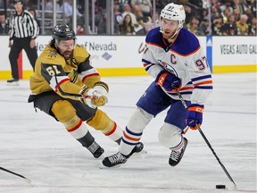 LAS VEGAS, NEVADA - MAY 12: Connor McDavid #97 of the Edmonton Oilers skates with the puck against Mark Stone #61 of the Vegas Golden Knights in the first period of Game Five of the Second Round of the 2023 Stanley Cup Playoffs at T-Mobile Arena on May 12, 2023 in Las Vegas, Nevada. The Golden Knights defeated the Oilers 4-3.