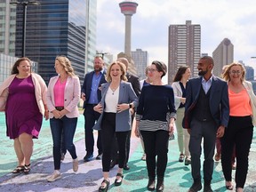 NDP Leader Rachel Notley walks with fellow NDP candidates following a campaign announcement at High Park in downtown Calgary on Thursday, May 25, 2023.