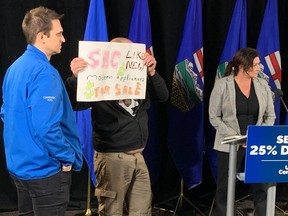 A group of protesters interrupted a UCP news conference in Calgary on Thursday, May 11, 2023.
