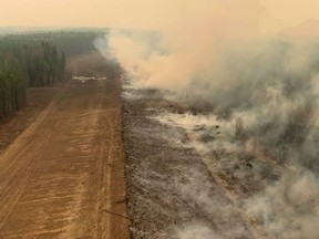 A burned section of forest near Edson is seen in a May 6, 2023, handout photo. Provincial authorities are classifying the fire, taking up approximately 77,000 hectares, as "out of control" as it has overrun the Minnow Lake Provincial Recreation Area.