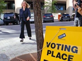 NDP leader Rachel Notley walks into an advance poll at the Central Library in Calgary on Tuesday, May 23, 2023.