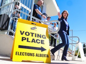 UCP leader Danielle Smith leaves after voting at an advance poll at the Haysboro Community Centre in Calgary on Tuesday, May 23, 2023.