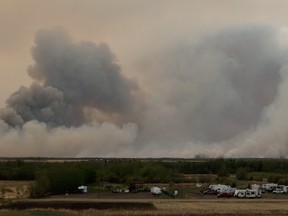 Smoke rises from a wildfire in Valleyview on May 6, 2023, in this screen grab obtained from a social media video.