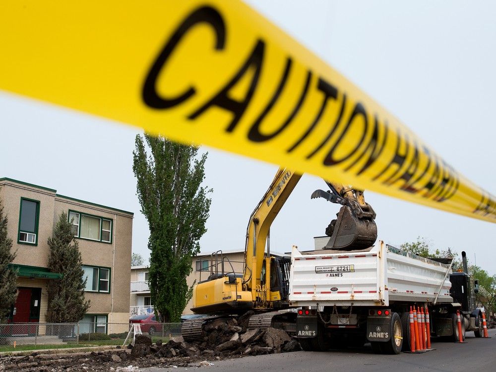 Crews work on the 124 Street renewal project site near 113 Avenue in Edmonton on Tuesday, May 16, 2023. 