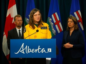 Premier of Alberta Danielle Smith along with Christie Tucker, information unit manager, Alberta Wildfire and Mike Ellis, Minister of Public Safety and Emergency Services provided an update on the wildfire situation at the McDougall Centre in Calgary on Saturday, May 6, 2023.
