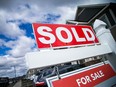 A sold sign in front of a home in Ontario.