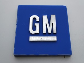 This Jan. 27, 2020, file photo shows a General Motors logo at the General Motors Detroit-Hamtramck Assembly plant in Hamtramck, Mich.