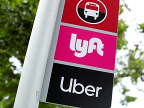 Transit ride-hailing sign Uber Lyft