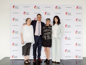 Patricia Kaliciak, left, had the full attention of University of Alberta Hospital supporters when she told of her double lung transplant. With her are Dr. Justin Weinkauf, who has cared for her for 17 years, University Hospital Foundation president and CEO Jodi Abbott and Joette Decore, the University Hospital Foundation's board chair. They were reunited on Thursday, May 11, 2023, at a University Hospital Foundation Spring Celebration at the Royal Glenora Club.